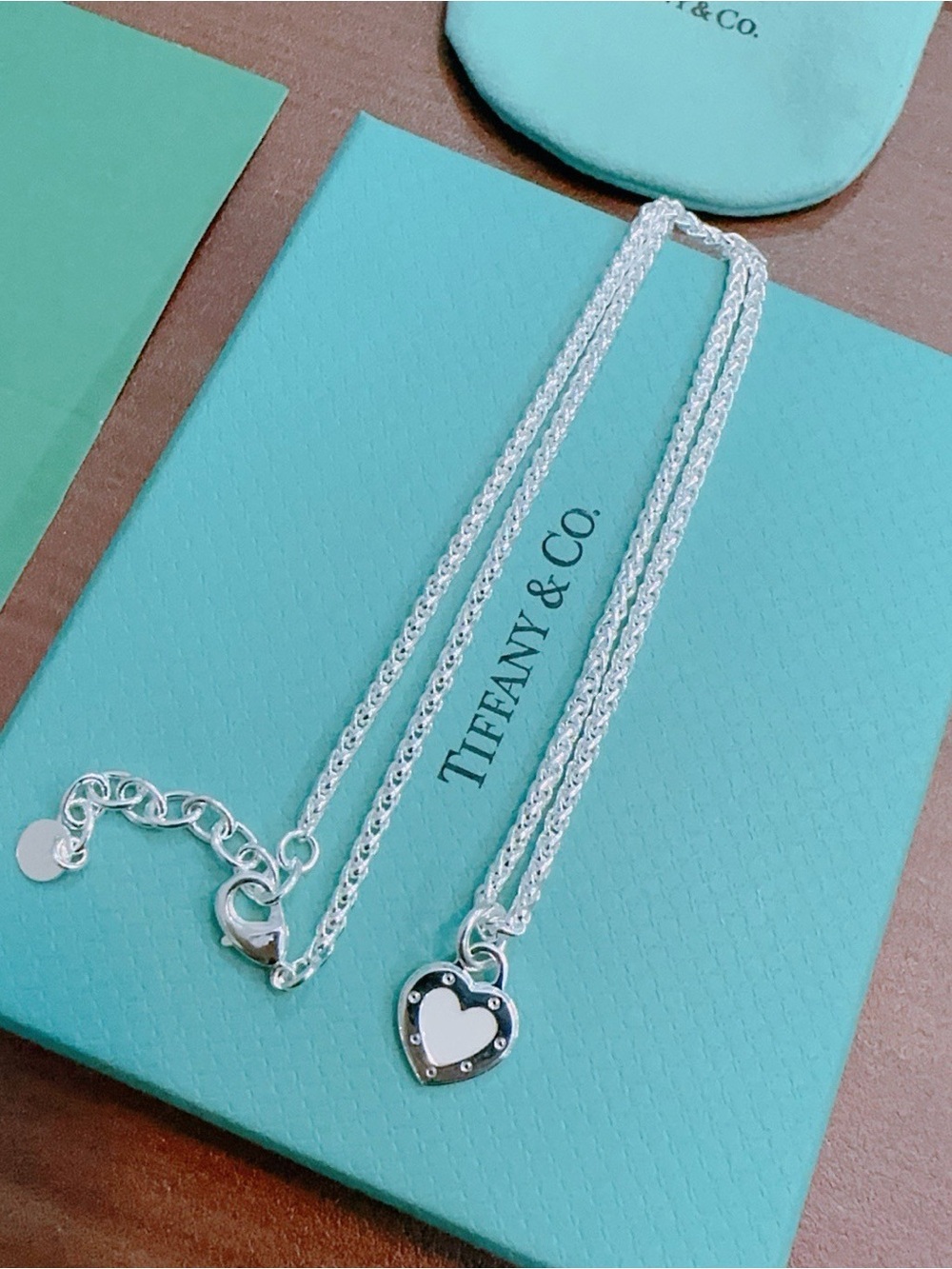 Tiffany & Co. Silver Heart Necklace with White Enamel Center